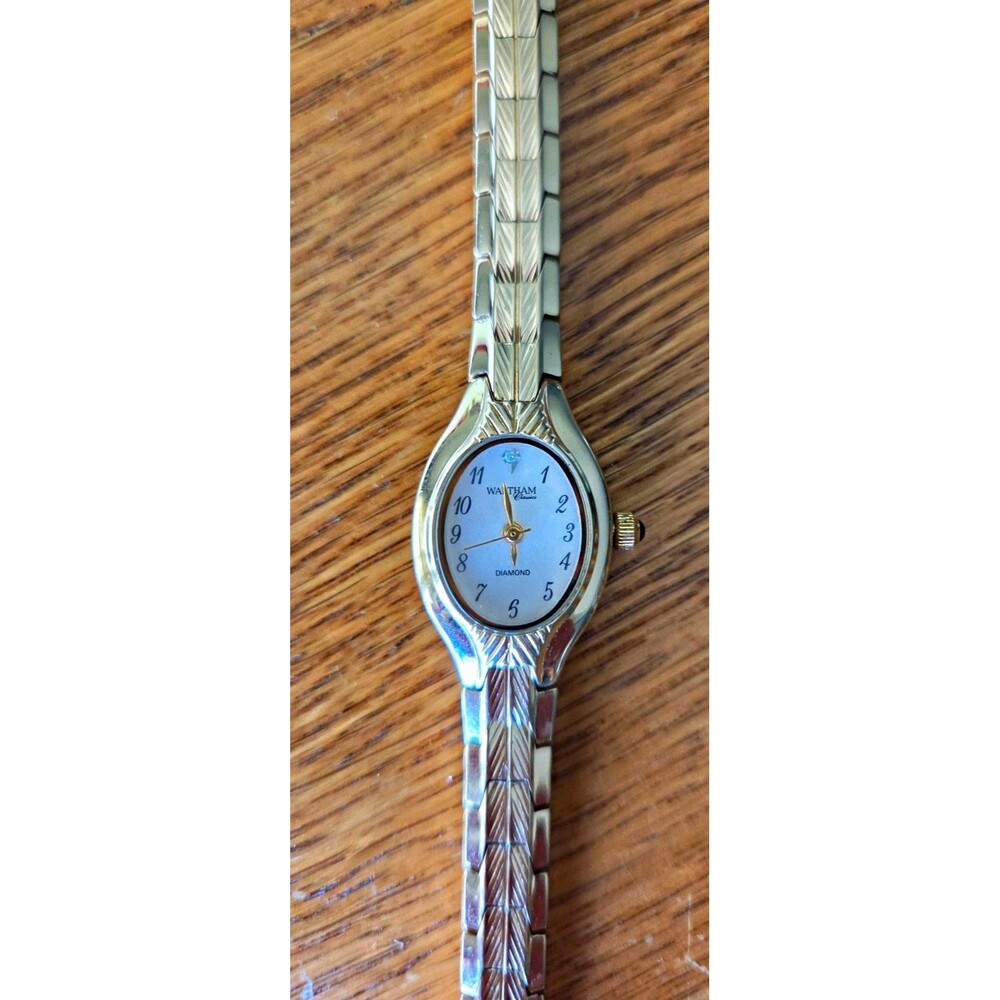 Waltham Petite Women's Gold Tone Oval Quartz Watch Diamond Accent White Dial